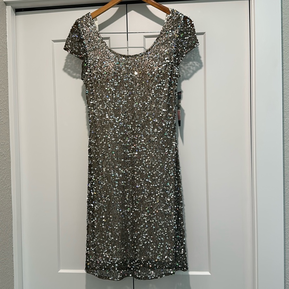 Beautiful sequins dress by jump apparel size 11/12 new with tags.